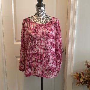 NWOT.  Woman’s sheer top with cocoon style fit and elastic cuffed sleeves.